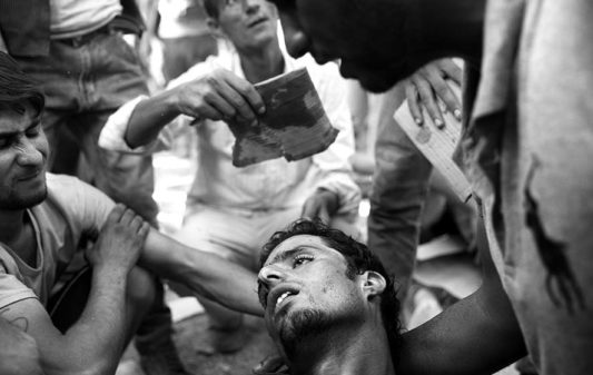 Exhaustion and long hours of waiting in extreme heat sometimes cause refugees to collapse and faint.
Lesbos, Greece, 2015